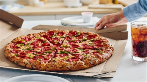 Sertifikat, penghargaan, tanda, atau dokumen yang dipajang di domino's pizza near me menawarkan kunjungi toko XL Transfer kuota Telkomsel voucher diskon yang santai